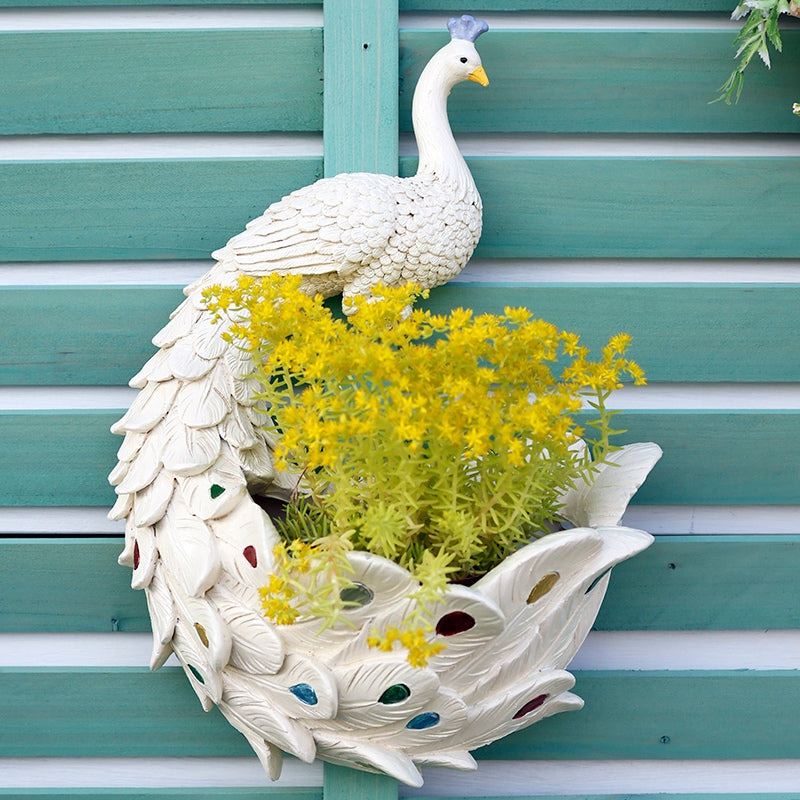 Dekorativ vægpotte i harpiks med påfugledesign til blomster og planter | Påfuglo