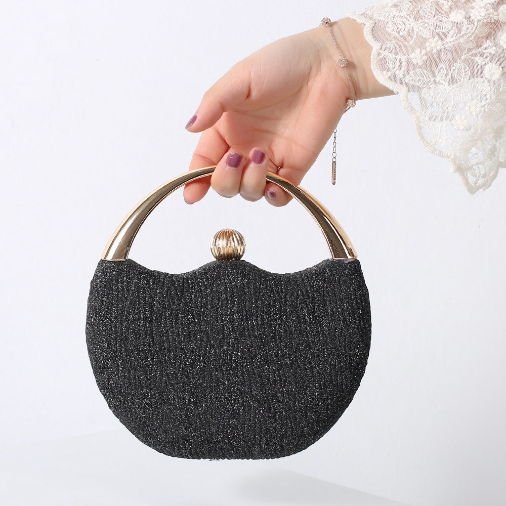 Clutch taske med lynlås og håndtag kompakt design | Rovira