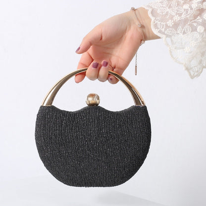 Clutch taske med lynlås og håndtag kompakt design | Rovira