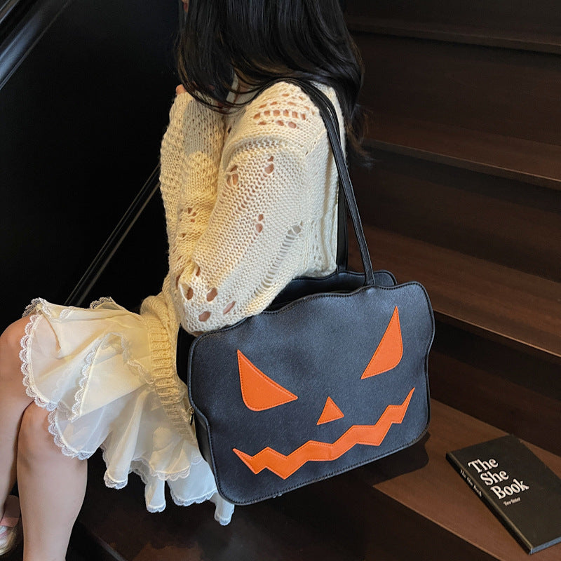 Skuldertaske med græskardesign kompakt PU taske til Halloween arrangementer | Ximena