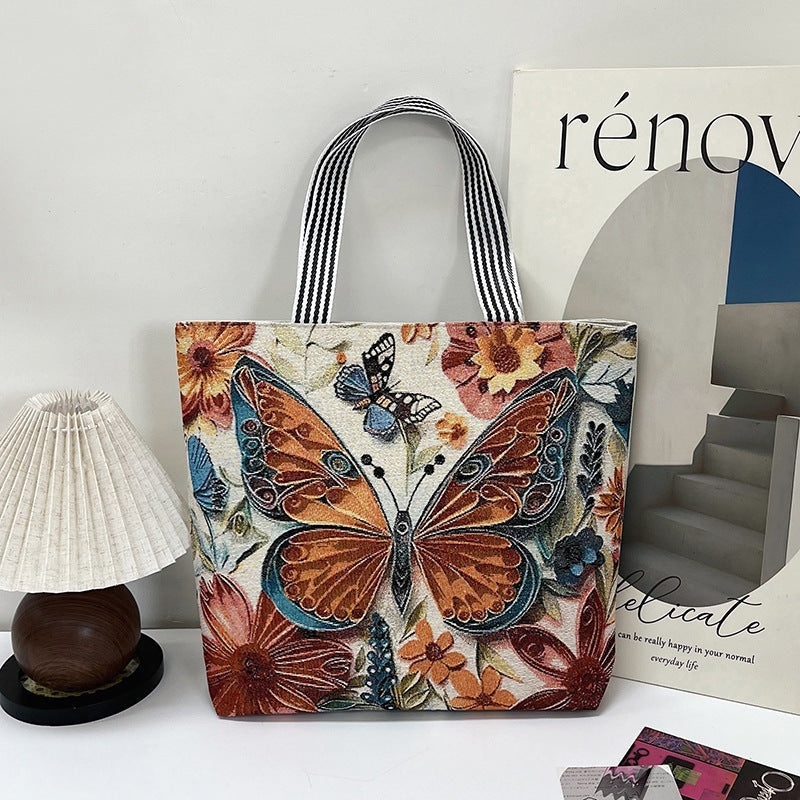 Tote taske med broderi og struktureret canvas design | Estrella