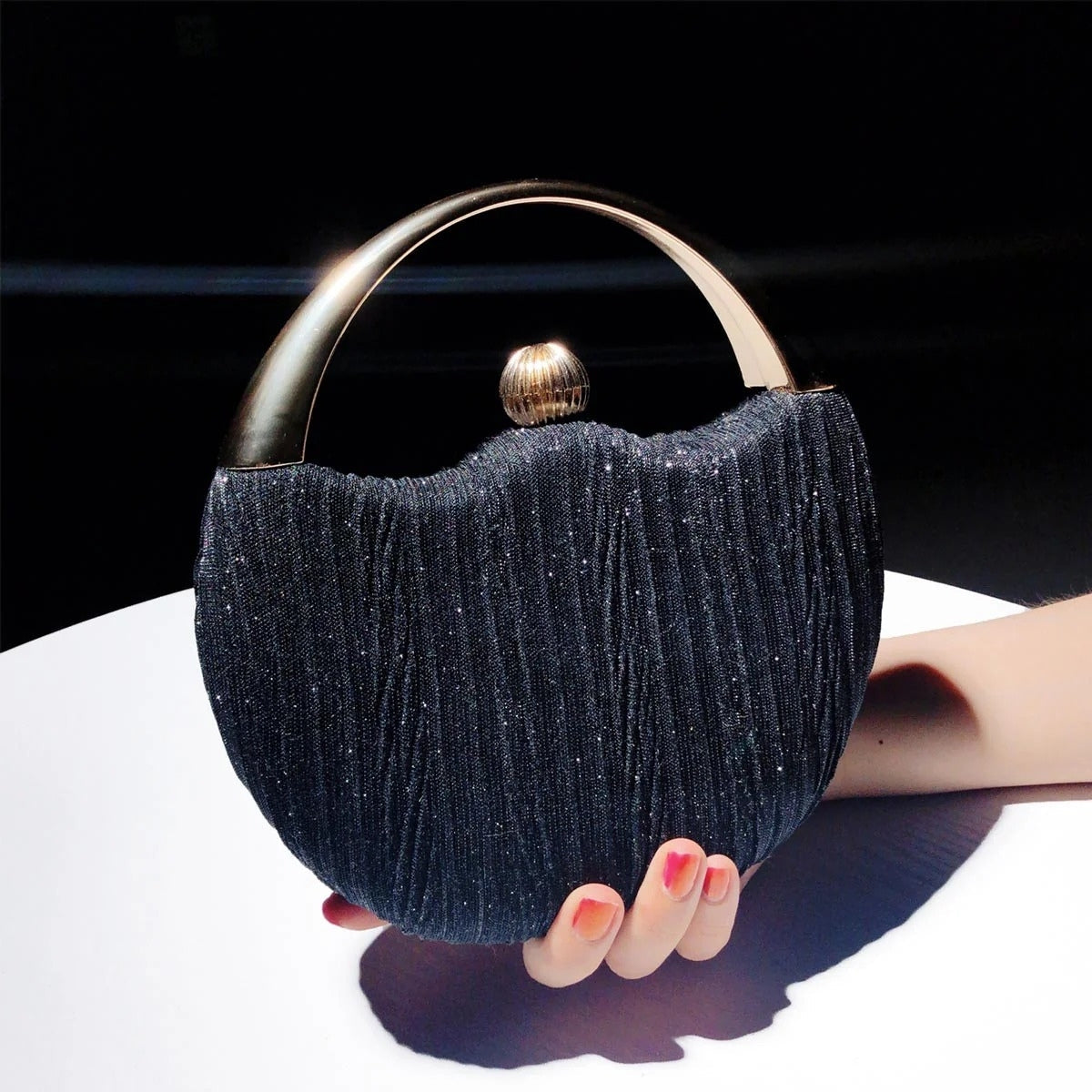 Clutch taske med lynlås og håndtag kompakt design | Rovira