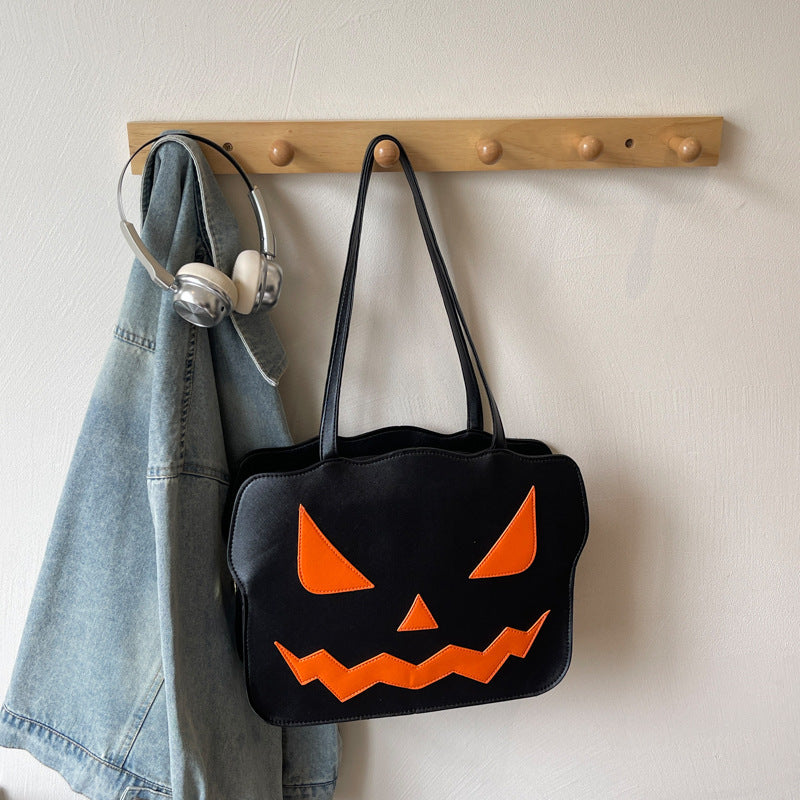 Skuldertaske med græskardesign kompakt PU taske til Halloween arrangementer | Ximena