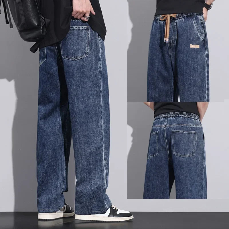 Løstsiddende herrejeans i denim med brede lige ben mellemhøj talje | Paul