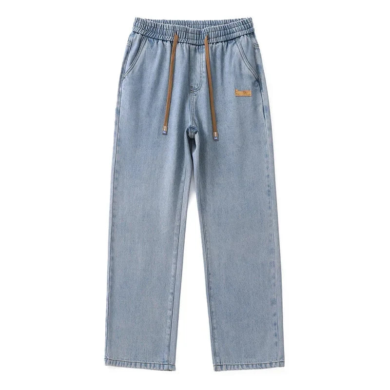 Løstsiddende herrejeans i denim med brede lige ben mellemhøj talje | Paul
