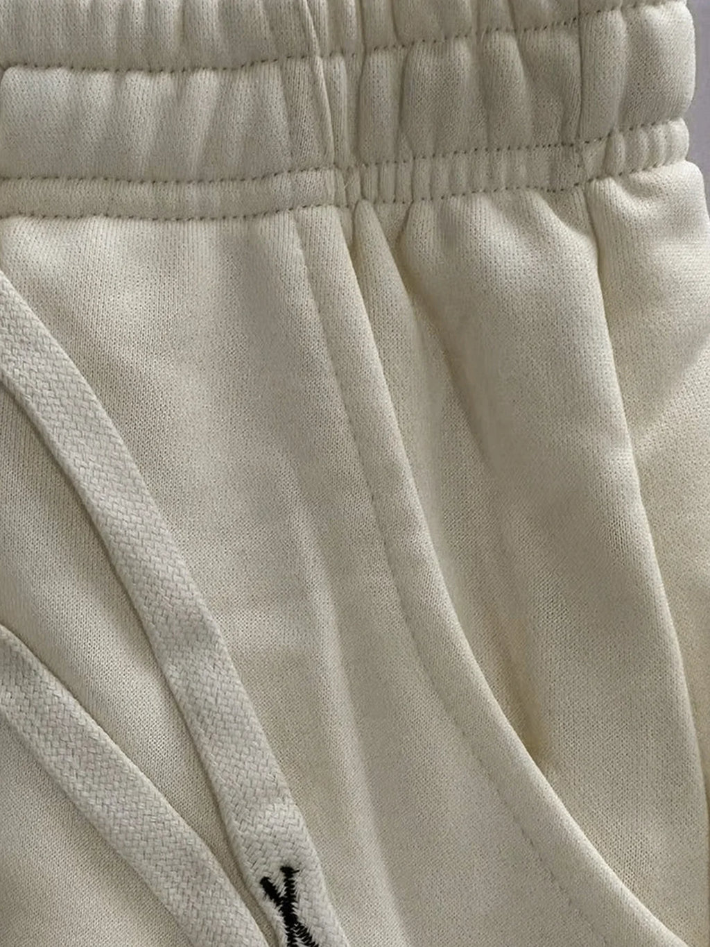 Løse joggingbukser til mænd med elastisk talje og bogstavdetaljer | Grégoire