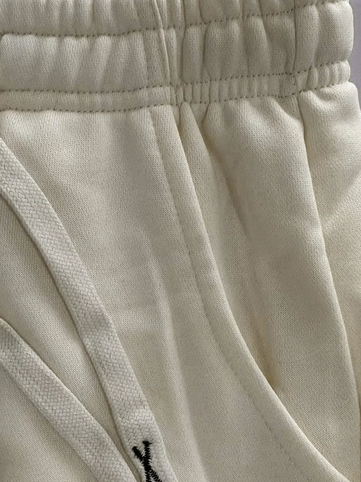 Løse joggingbukser til mænd med elastisk talje og bogstavdetaljer | Grégoire