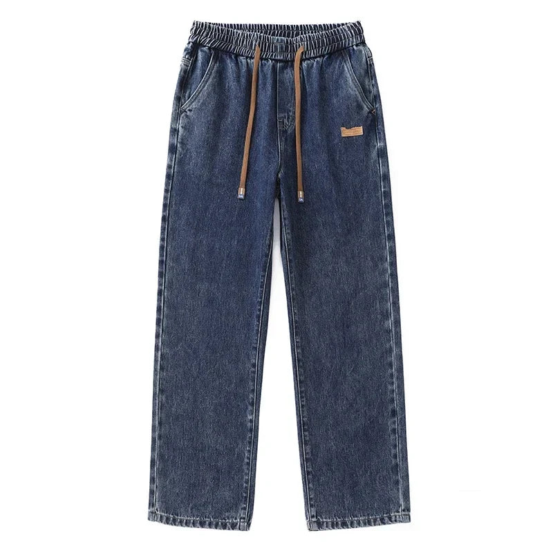 Løstsiddende herrejeans i denim med brede lige ben mellemhøj talje | Paul