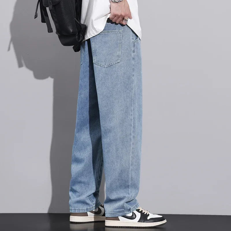 Løstsiddende herrejeans i denim med brede lige ben mellemhøj talje | Paul