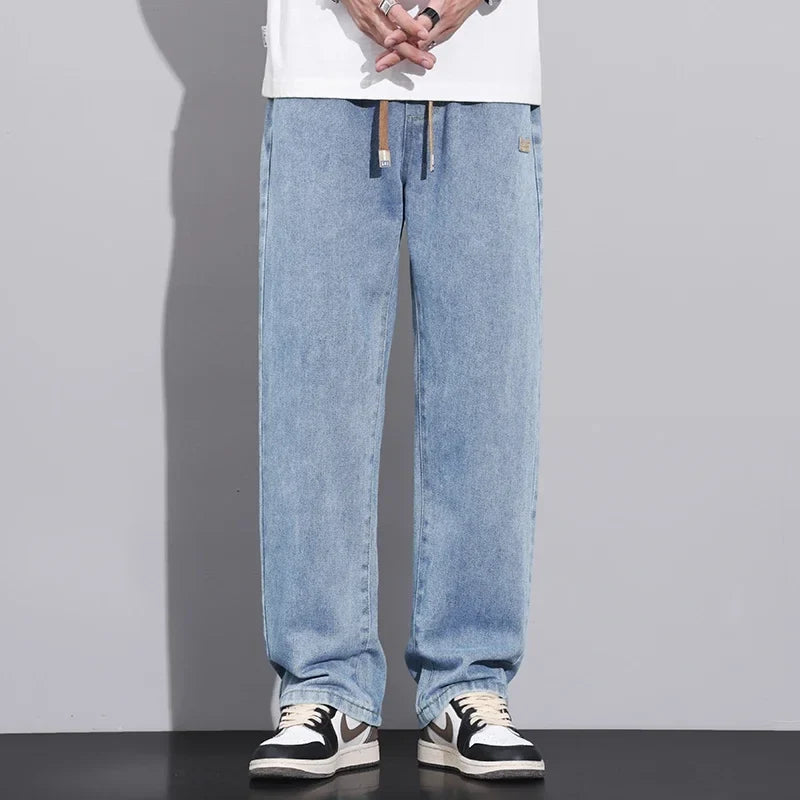 Løstsiddende herrejeans i denim med brede lige ben mellemhøj talje | Paul