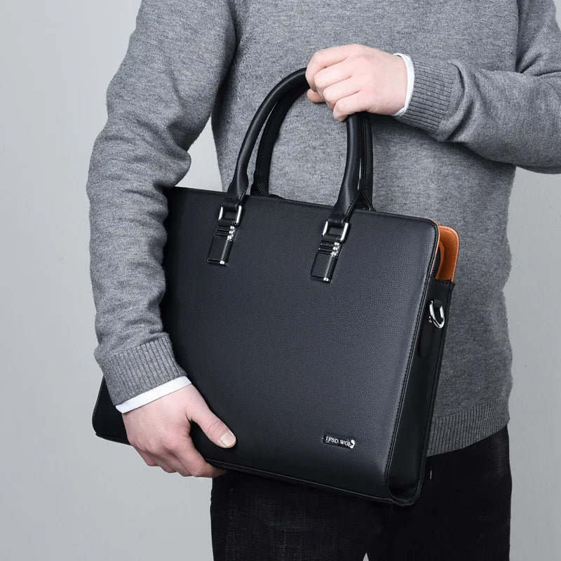 Laptoptas til mænd i læder med skulderrem og organiserede rum | Álvaro