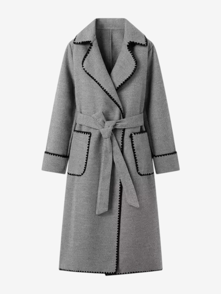 Elegant lang trenchcoat med justerbar talje og sidelommer | Disty