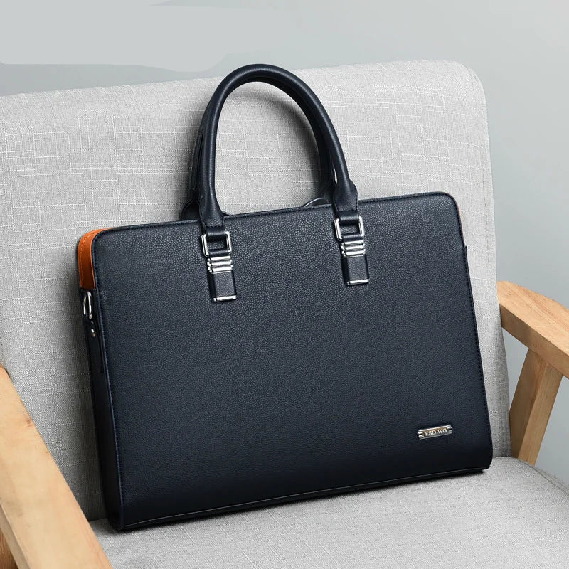 Laptoptas til mænd i læder med skulderrem og organiserede rum | Álvaro